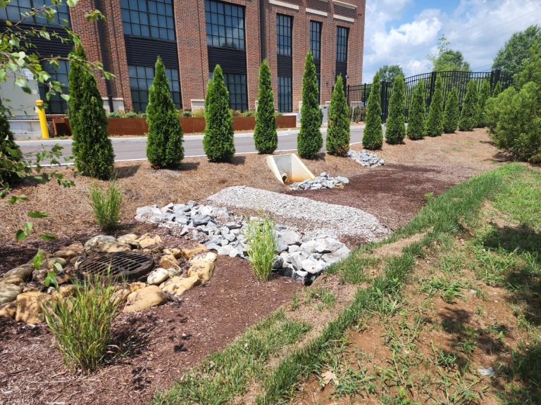 Brick building at the Monarch Showroom site, showcasing M2 Group's low-impact stormwater design